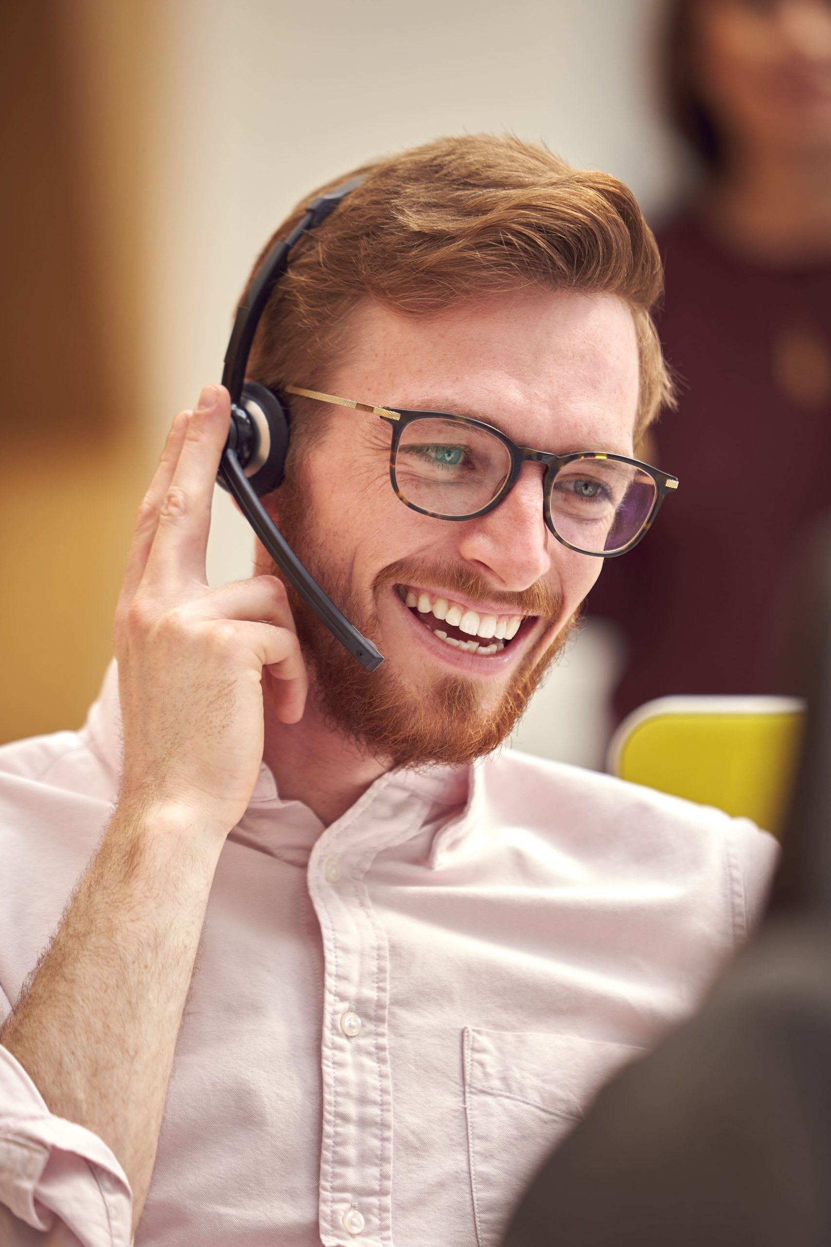 businessman-wearing-headset-talking-to-caller-in-b-2021-12-09-06-51-03-utc (1)